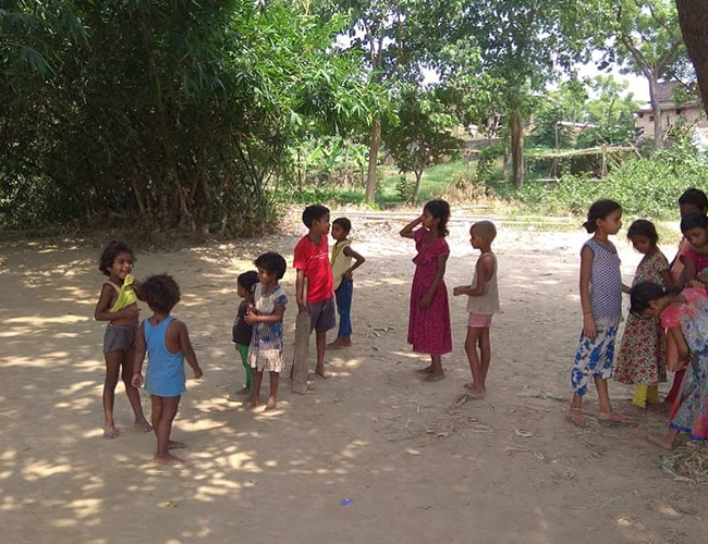Children smiling at a child welfare centre